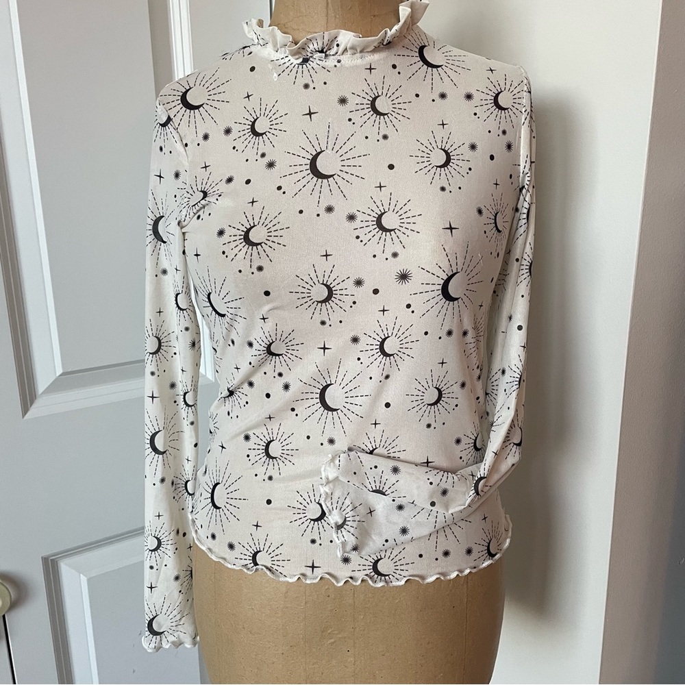 Sheer celestial cream top